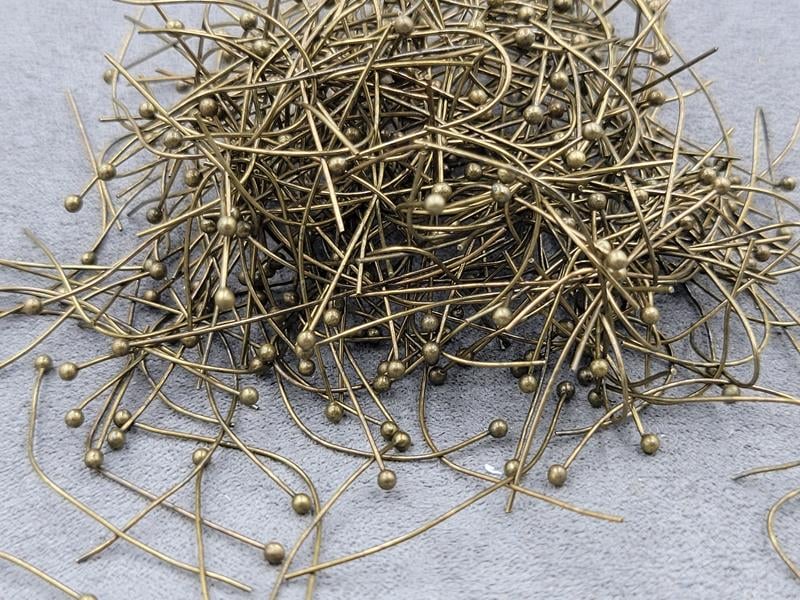 Піни 4 см біля 500 шт колір бронза