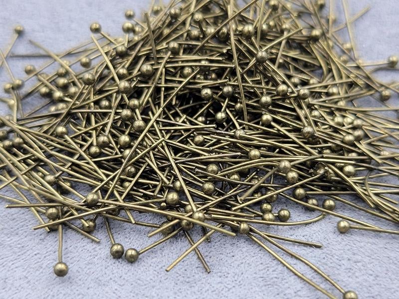 Піни 2 см біля 500 шт колір бронза