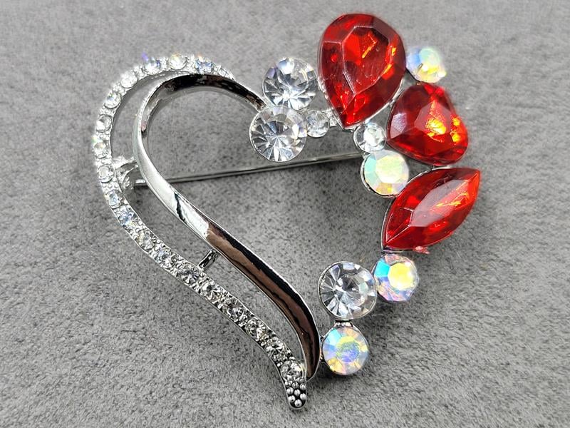 Брошка 4*4,5 см колір срібло