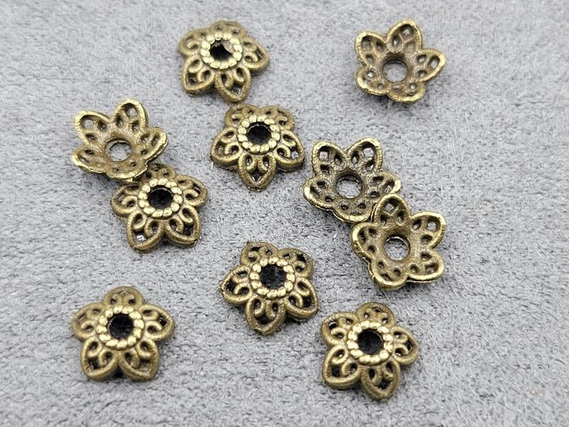 Обіймачі 8 мм 120 шт колір бронза металічні