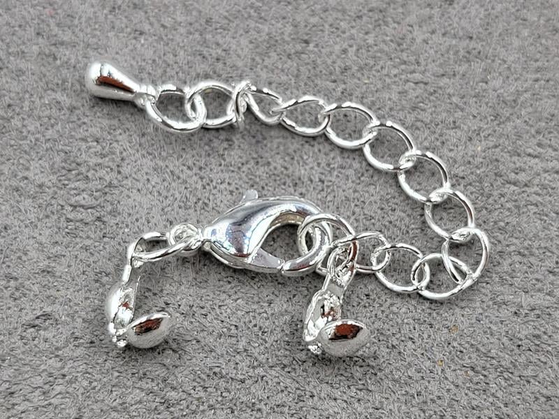 Замок 12 мм колір срібло з колотами (гіпоалергенний сплав)