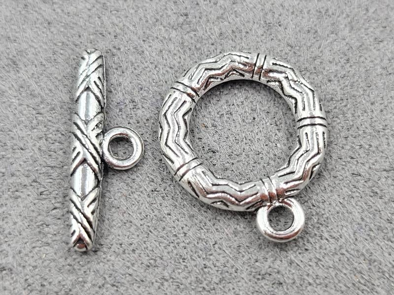 Замок тогл 15 мм 10 штук металічний