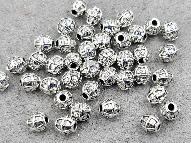 Бусина 3,5*4 мм 130 шт металічна