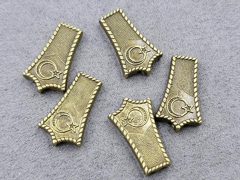 Бусина 14*23*3,6 мм 7 шт колір бронза