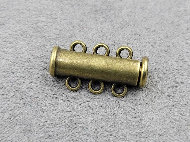 Замок магнітний 6*21 мм на 3 лінії колір бронза