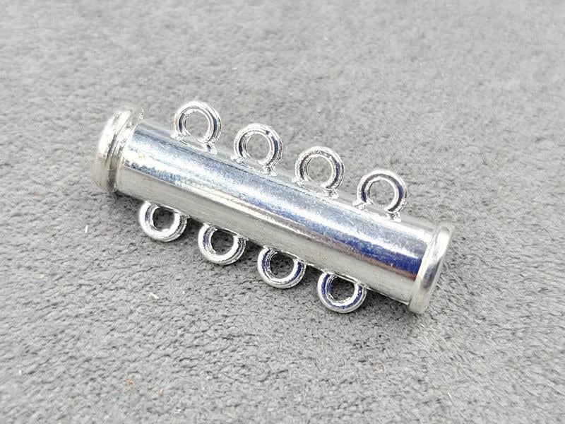 Замок магнітний 6*27 мм на 4 лінії колір срібло