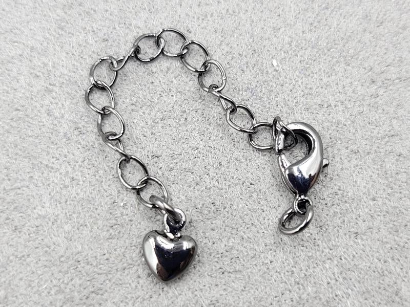 Замок 10 мм колір чорний з підвіскою серце (гіпоалергенний сплав)