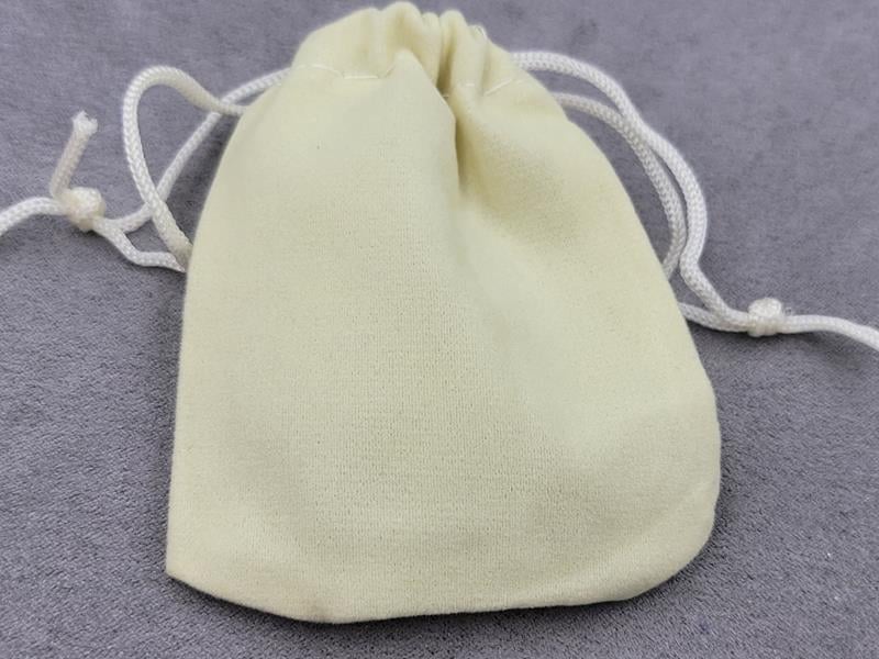 Мішечки бархатні 7*9 см 10 штук молочні