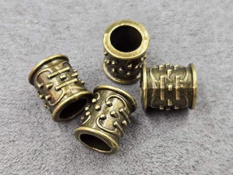 Бусина 10*12 мм отв. 6,5 мм 12 шт колір бронза