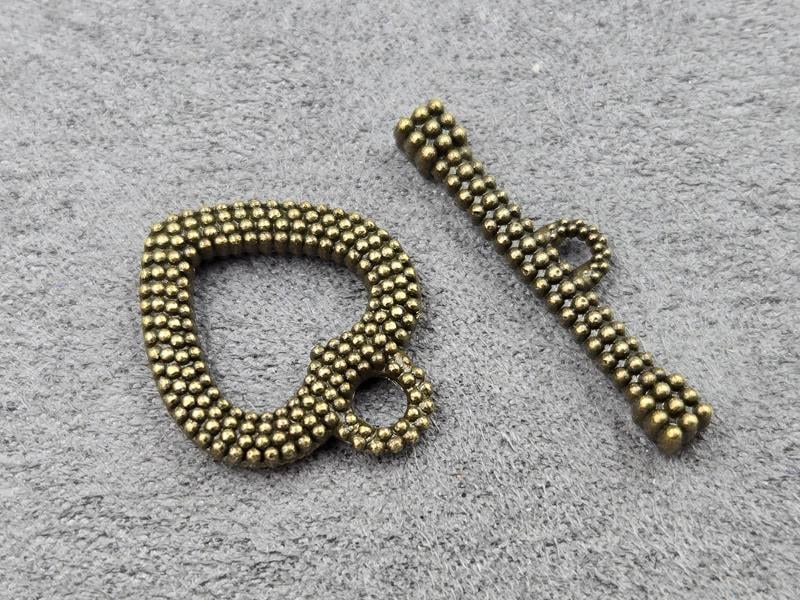 Замок тогл 18*21 мм 10 штук колір бронза