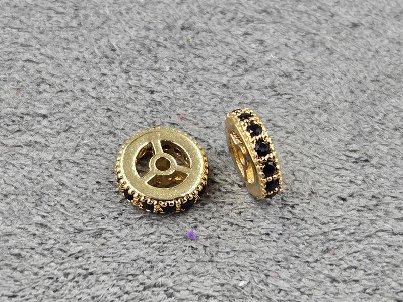 Рондель 6*2 мм колір лимонне золото з чорними стразами (гіпоалергений сплав)