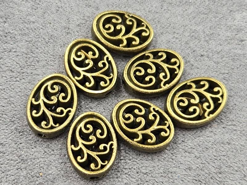 Бусини 9*12 мм 28 шт колір бронза