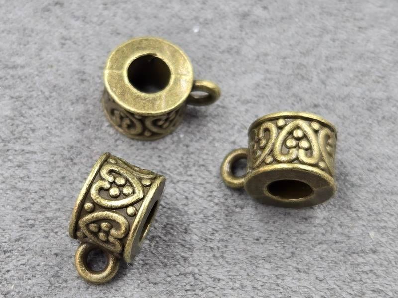 Бейли 7*9 мм 9 шт колір бронза