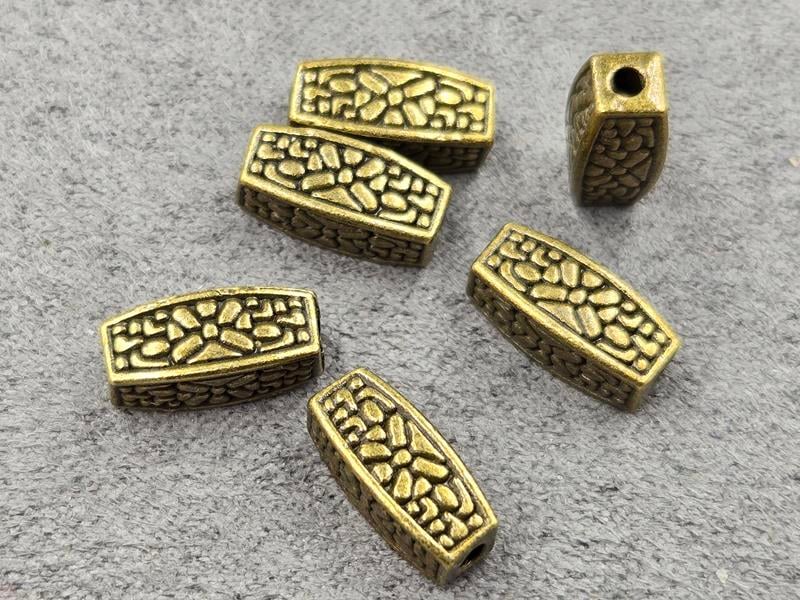 Бусини 5*12 мм 19 шт колір бронза