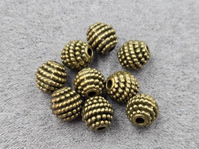 Бусини куля 8 мм 18 шт колір бронза