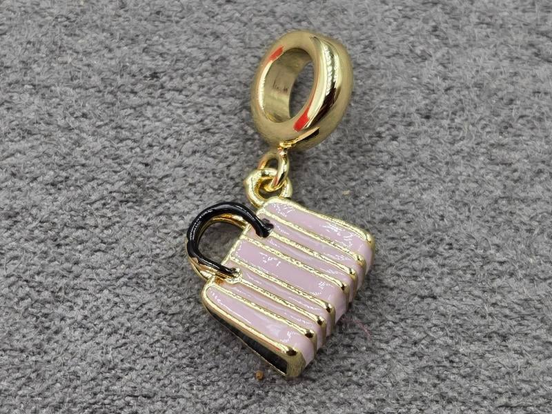 Підвіска сумочка 10*11,5 мм з бейлом 8*2,7 мм колір лимонне золото (гіпоалергений сплав)