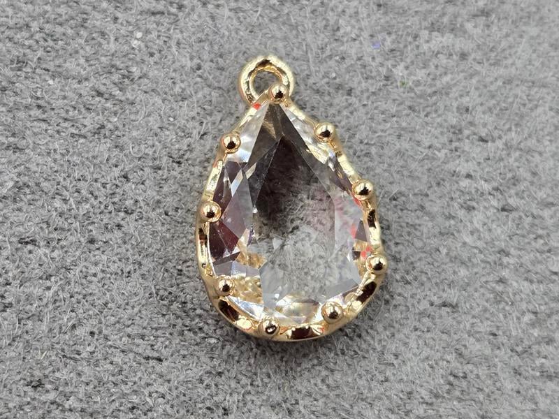 Підвіска крапля 12*18 мм з білим стразом колір золото (гіпоалергений сплав)