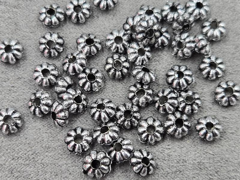 Бусина 6*3 мм 250 шт пластикова