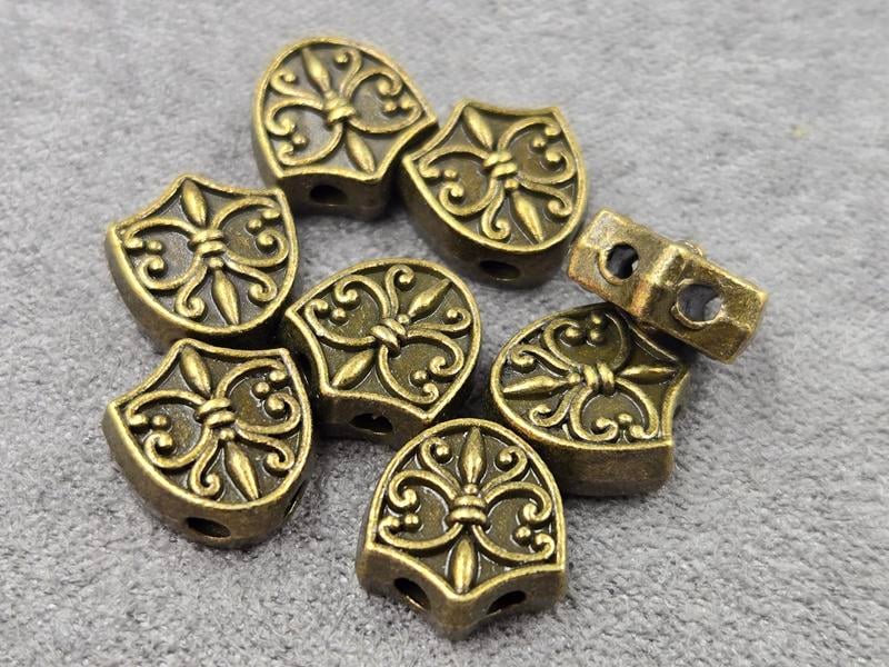 Бусини 10*11*5 мм 15 шт колір бронза