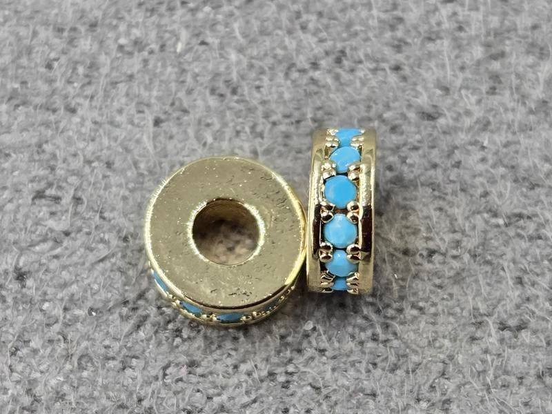 Рондель 6*2 мм колір золото з блакитними стразами ( гіпоалергений сплав)