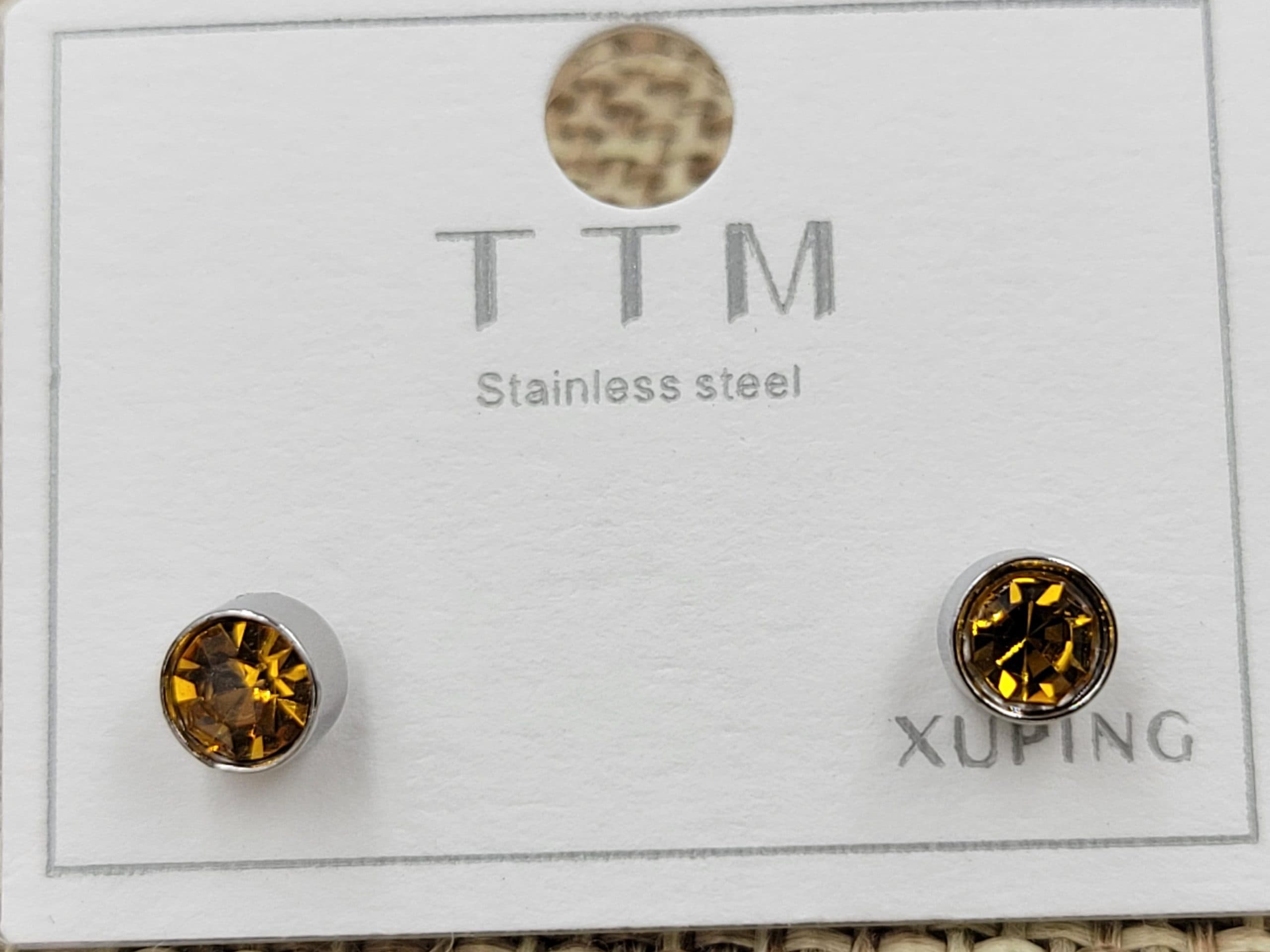 Гвоздики ТТМ Xuping з медовим фіанітом 5 мм родий